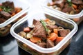 beef bourguignon meal prepped in individual containers