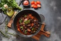 Beef Bourguignon in a pan. Stew  with red wine ,carrots, onions, garlic, Royalty Free Stock Photo