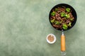 Beef and broccoli stir fry in a small wok Royalty Free Stock Photo