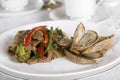 Beef and broccoli stirfry on table Royalty Free Stock Photo