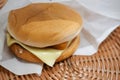 beef burger and french fries in a takeaway paper box on table Royalty Free Stock Photo