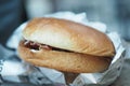 beef burger and french fries in a takeaway paper box on table Royalty Free Stock Photo