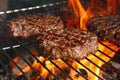 Beef burger for hamburger on barbecue flame grill Royalty Free Stock Photo