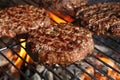 Beef burger for hamburger on barbecue flame grill Royalty Free Stock Photo