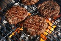 Beef burger for hamburger on barbecue flame grill Royalty Free Stock Photo