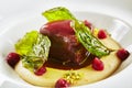 Beef Cheeks in Cherry Glaze with Potato-Celery Cream and Sauce of Dried Berries Royalty Free Stock Photo