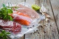 Beef, chicken and salmon in vacuum plastic bag for sous vide cooking Royalty Free Stock Photo