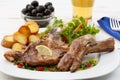 Beef chops with potatoes and salad Royalty Free Stock Photo