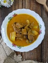 beef curry on a floral bowl served during eid or iftar ramadan