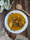 beef curry on a floral bowl served during eid or iftar ramadan