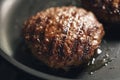 Beef cutlets on frying pan closeup Royalty Free Stock Photo