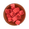 Beef flavored bouillon cubes wrapped in a bowl top view Royalty Free Stock Photo