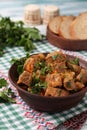 Beef goulash is located in a brown bowl on the table Royalty Free Stock Photo