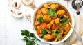 Beef goulash. Meat stew with vegetables and mushrooms with red wine, traditinal dish of french cuisine. Top view with copy space Royalty Free Stock Photo