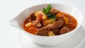 Beef goulash, soup and a stew, made of beef chuck steak, potatoes and plenty of paprika. Hungarian traditional meal