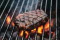 Beef grilling over charcoal barbecue, sizzling and savory