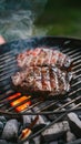 Beef grilling over charcoal barbecue, sizzling and savory