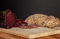 Beef Ham. Grains. Wooden. Meat. Smoked. Bread