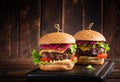 Hamburger. Sandwich with beef burger, tomatoes, cheese, pickled cucumber and lettuce. Cheeseburger Royalty Free Stock Photo