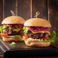 Hamburger. Sandwich with beef burger, tomatoes, cheese, pickled cucumber and lettuce. Cheeseburger Royalty Free Stock Photo