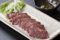 Beef heart stabbing Salt with wasabi and Ginger soy sauce on platter Royalty Free Stock Photo