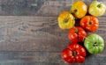 Beef heart tomatoes in the basket on wooden background Royalty Free Stock Photo