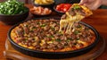 Beef and jalape?o pizza with melted cheese Royalty Free Stock Photo