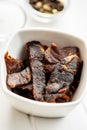Beef jerky pieces. Dried beef meat Royalty Free Stock Photo