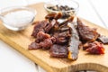 Beef jerky pieces. Dried beef meat Royalty Free Stock Photo