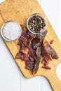 Beef jerky pieces. Dried beef meat Royalty Free Stock Photo