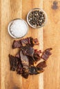 Beef jerky pieces. Dried beef meat Royalty Free Stock Photo