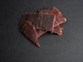 Beef Jerky soled on black Royalty Free Stock Photo