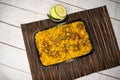 beef khichuri biryani rice pulao with cucumber and lemon slice served in dish isolated on wooden table closeup top view of Royalty Free Stock Photo