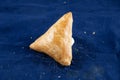 Beef Kolija Shingara or samosa, singara, somucha isolated on blue background side view of savory snack food