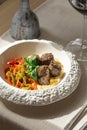 Beef kufte with hummus and roasted vegetables Royalty Free Stock Photo