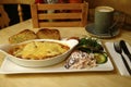 Beef lasagne served with a side salad Royalty Free Stock Photo