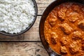 Beef Madras curry slow cook Indian spicy lamb food with rice in cast iron pan Royalty Free Stock Photo