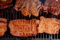 Beef meat barbecue grilled with embers and smoke Royalty Free Stock Photo