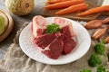 Beef meat, marrow bones and fresh vegetables - ingredients for a homemade bone broth Royalty Free Stock Photo