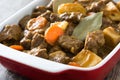 Beef meat stewed with potatoes, carrots and spices in ceramic pot Royalty Free Stock Photo