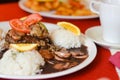 Beef medallion with Rosini mashroom sauce served with rice Royalty Free Stock Photo