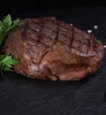 Beef medallion steak on a black background Royalty Free Stock Photo