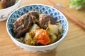 Beef noodle soup. Taiwanese famous food in a bowl on wooden table