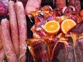 Beef pastrama vacuum packed and pork sausages Royalty Free Stock Photo