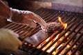 Chef making burger. Beef or pork meat barbecue burgers for hamburger prepared grilled on bbq fire flame grill. Close-up Royalty Free Stock Photo