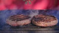 Beef or pork meat barbecue burgers for hamburger prepared grilled on bbq fire flame grill. Tasty meat for burger cooked Royalty Free Stock Photo