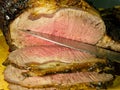 Beef prime rib roast in stages of preparation Royalty Free Stock Photo