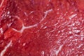 Beef raw red meat closeup texture background. Fresh beef piece in closeup. Marbled meat texture. Raw fillet of beef steak. Royalty Free Stock Photo