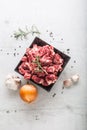 Beef. Raw sliced beef meat garlic onion salt pepper and rosemary Royalty Free Stock Photo