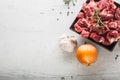 Beef. Raw sliced beef meat garlic onion salt pepper and rosemary Royalty Free Stock Photo